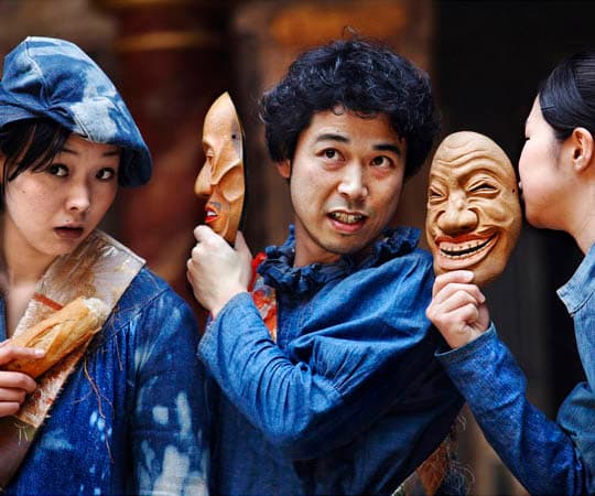 Three actors performing in the production Coriolanus in the language Japanese at Shakespeare’s Globe Theatre, London